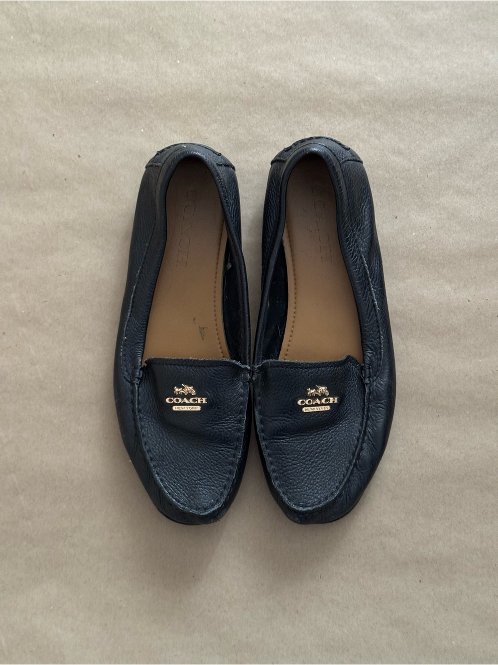 Coach Black Pebbled Leather Slip-On Loafers with Gold Logo